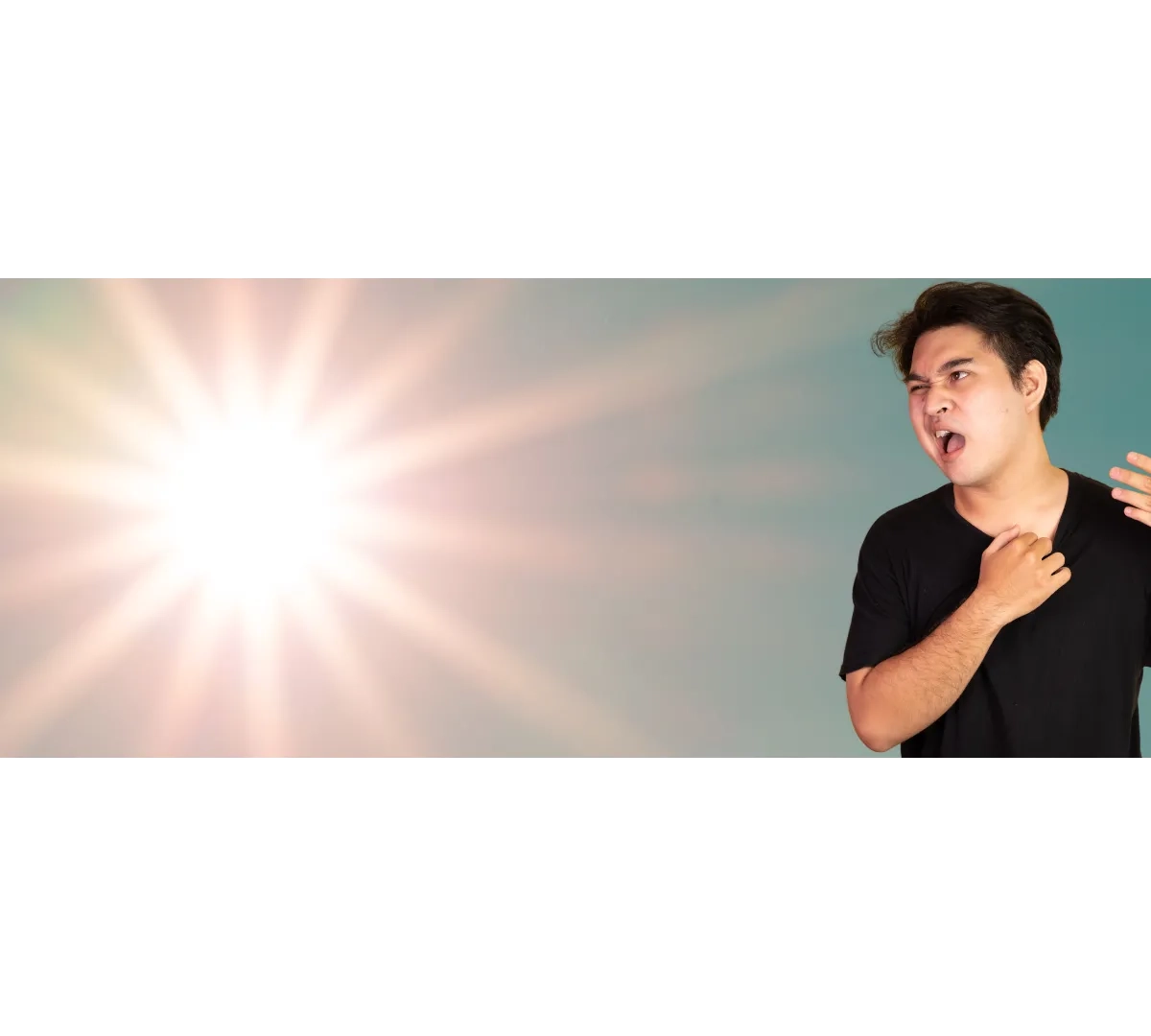 Person fanning neck under bright sun rays, illustrating heatwave discomfort and the importance of staying cool, hydrated, and safe in hot weather